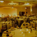 amber uplighting wedding reception