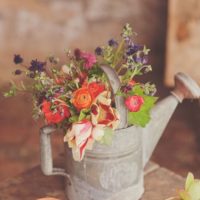 spring watering can centerpiece