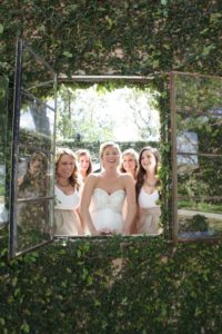 bridesmaids through the window