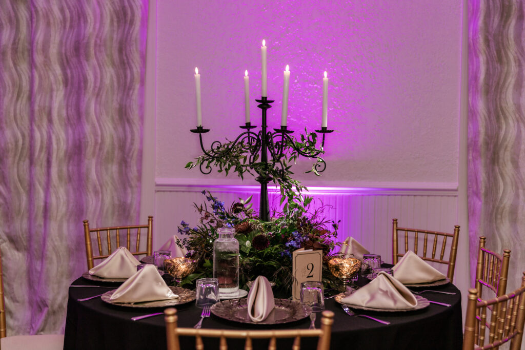 black candelabra wedding centerpiece