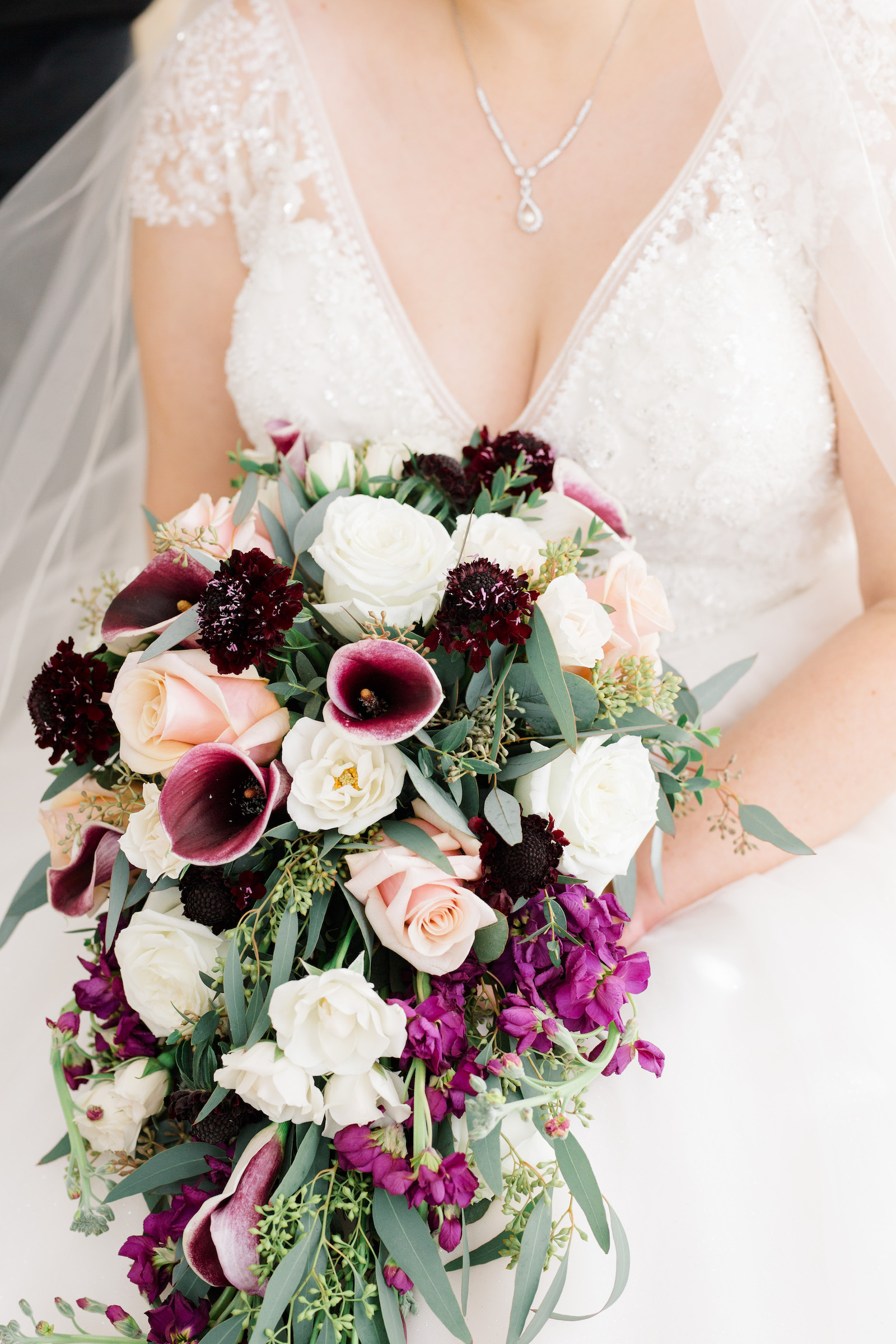 purple cascading wedding bouquet